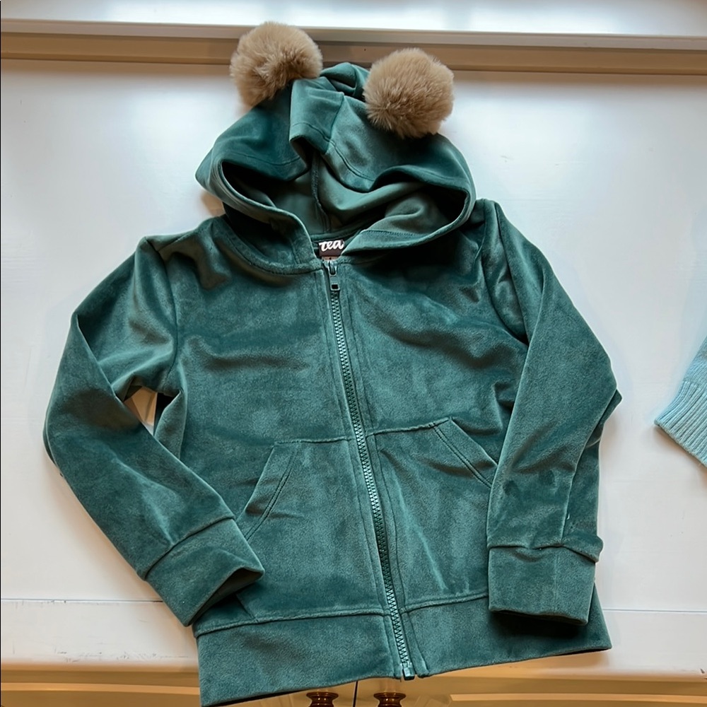 Tea brand Hoodie with Fur Pom Poms